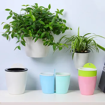 2019 New Self Watering Plant Flower Pot Wall Hanging Round Resin Plastic Planter Basket Garden Supply Home Garden with Hooks
2019 New Self Watering Plant Flower Pot Wall Hanging Round Resin Plastic Planter Basket Garden Supply Home Garden with Hooks