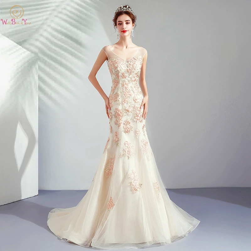 Elegant Wedding Dresses 2019 Colorful Champagne Lace Appliques Mermaid V neck Backless Bridal Gowns Cap Sleeves Sweep Train
Elegant Wedding Dresses 2019 Colorful Champagne Lace Appliques Mermaid V neck Backless Bridal Gowns Cap Sleeves Sweep Train