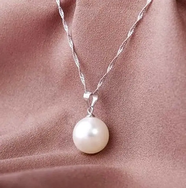 14mm Women White shell Pearl Oyster Drop Pendant Silver Chain Jewelry Pendant Necklace
14mm Women White shell Pearl Oyster Drop Pendant Silver Chain Jewelry Pendant Necklace