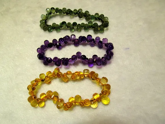 6x9mm Natural clear white quartz Amethyst -Citrine-Green- Red crystal drops teardrop briolettes micro faceted bracelet 8inch AAA
6x9mm Natural clear white quartz Amethyst -Citrine-Green- Red crystal drops teardrop briolettes micro faceted bracelet 8inch AAA