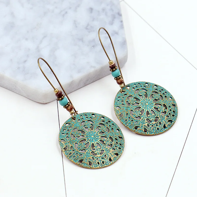 Vintage Indian Hollow Totem Round Earrings with Pendant Female Retro Ethnic Statement Beads Stone Drop Ear Cuff Earrings Hoop
Vintage Indian Hollow Totem Round Earrings with Pendant Female Retro Ethnic Statement Beads Stone Drop Ear Cuff Earrings Hoop