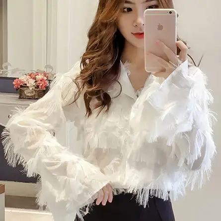 spring Loose V-neck tassel feather chiffon shirt temperament flare sleeve blouse
spring Loose V-neck tassel feather chiffon shirt temperament flare sleeve blouse