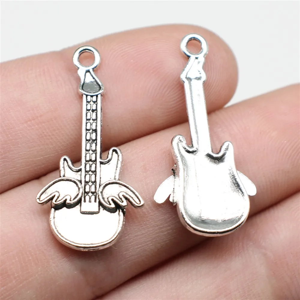 WYSIWYG 10pcs Charms Guitar Antique Silver Color 31x10mm Metal Alloy Jewelry DIY Accessories
WYSIWYG 10pcs Charms Guitar Antique Silver Color 31x10mm Metal Alloy Jewelry DIY Accessories