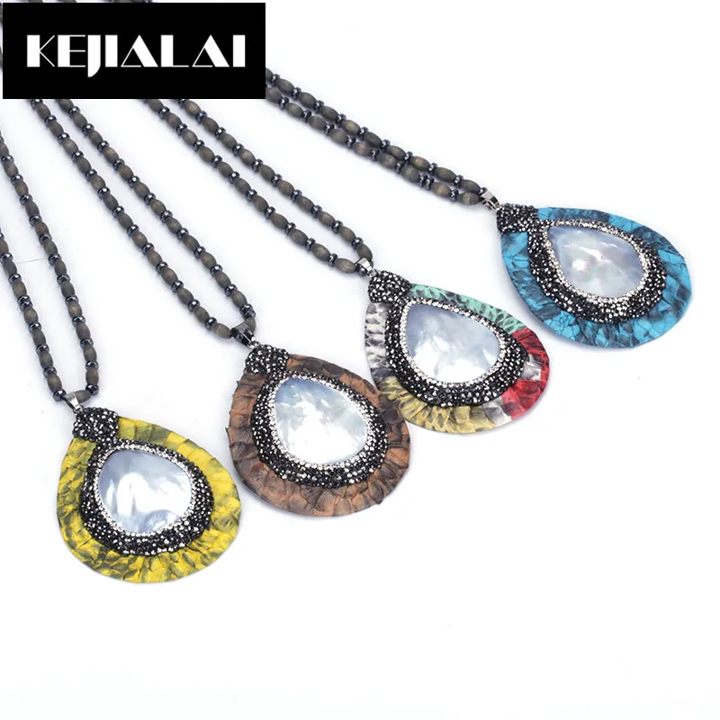 KEJIALAI Fashion Water Drop Shape Pendant Necklace for Women Geniune Leather Paved with Pearl and Rhinestone Luxury Accessories
KEJIALAI Fashion Water Drop Shape Pendant Necklace for Women Geniune Leather Paved with Pearl and Rhinestone Luxury Accessories