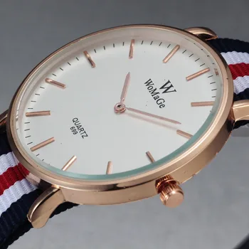 Luxury Brand WoMaGe Fashion Women Casual Wrist Watches Steel Case Quartz Simple Dial Fabric Strap Clock Relogio feminino
Luxury Brand WoMaGe Fashion Women Casual Wrist Watches Steel Case Quartz Simple Dial Fabric Strap Clock Relogio feminino