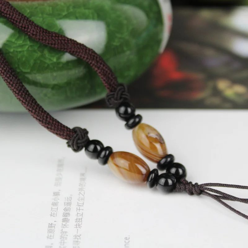 KYSZDL original design Handmade rope Using the pendant match sardonyx stone and black stone beads
KYSZDL original design Handmade rope Using the pendant match sardonyx stone and black stone beads