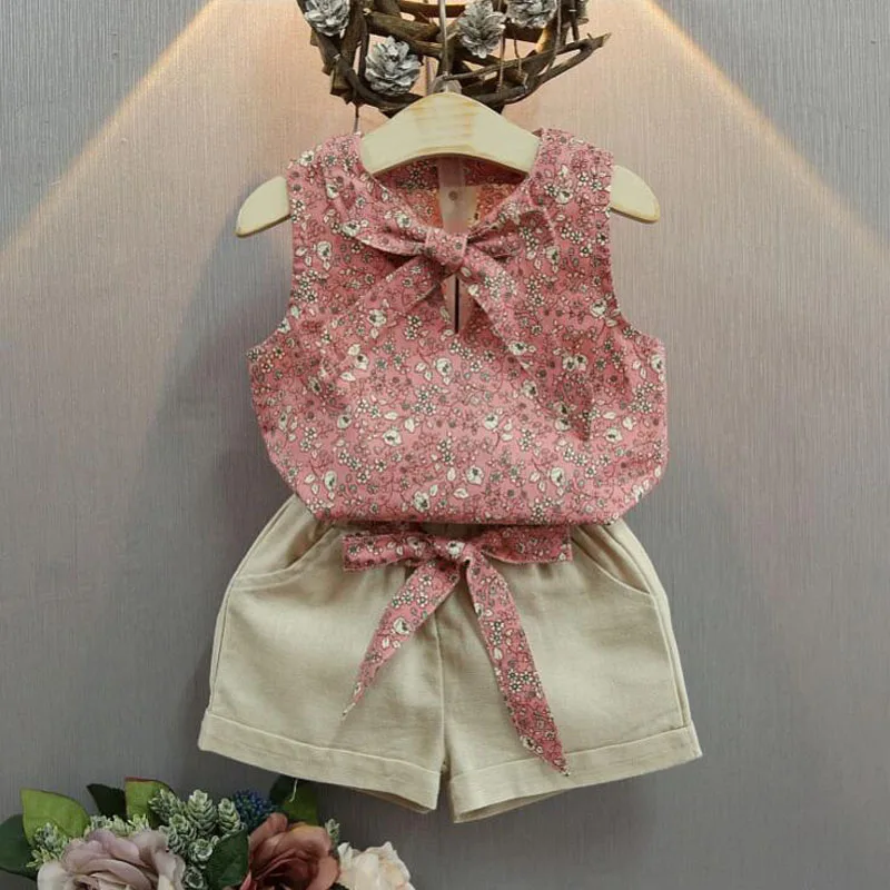 2PCS Baby Girls Clothes Suits Flower Bow-knot Kids Summer Clothes Sleeveless T Shirt +Short Pants Children Outfits Sets
2PCS Baby Girls Clothes Suits Flower Bow-knot Kids Summer Clothes Sleeveless T Shirt +Short Pants Children Outfits Sets