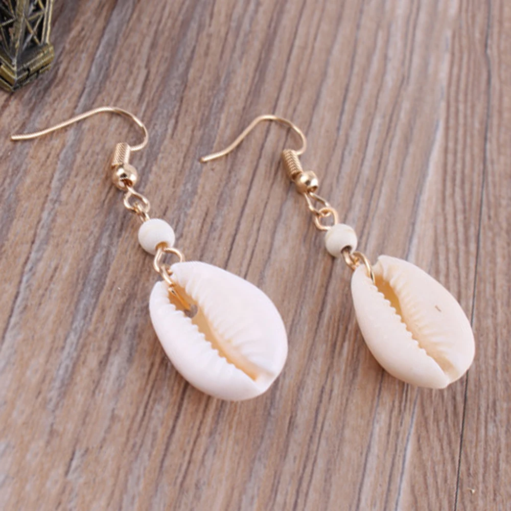 1 Pair Retro Natural Shell Drop Earrings Women Bohemian Handmade Conch Dangle Earrings Summer Holiday Pendants Simple Fashion
1 Pair Retro Natural Shell Drop Earrings Women Bohemian Handmade Conch Dangle Earrings Summer Holiday Pendants Simple Fashion
