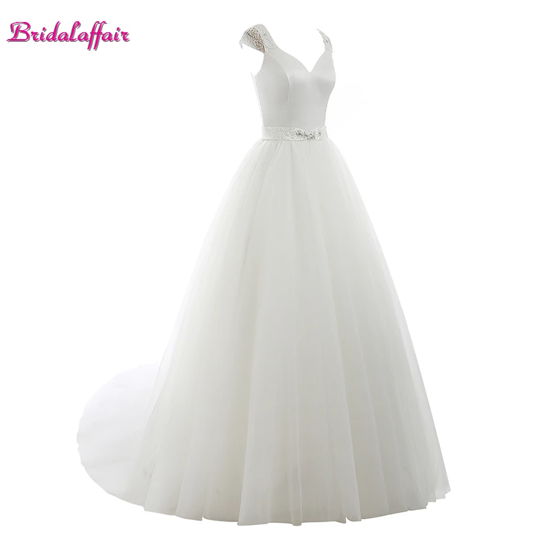 KapokBanyan Real Photo V Neck Appliques Ball Gown Wedding Dresses 2017 Cheap Bckless Bridal Gown Custom made Vestido de noiva
KapokBanyan Real Photo V Neck Appliques Ball Gown Wedding Dresses 2017 Cheap Bckless Bridal Gown Custom made Vestido de noiva