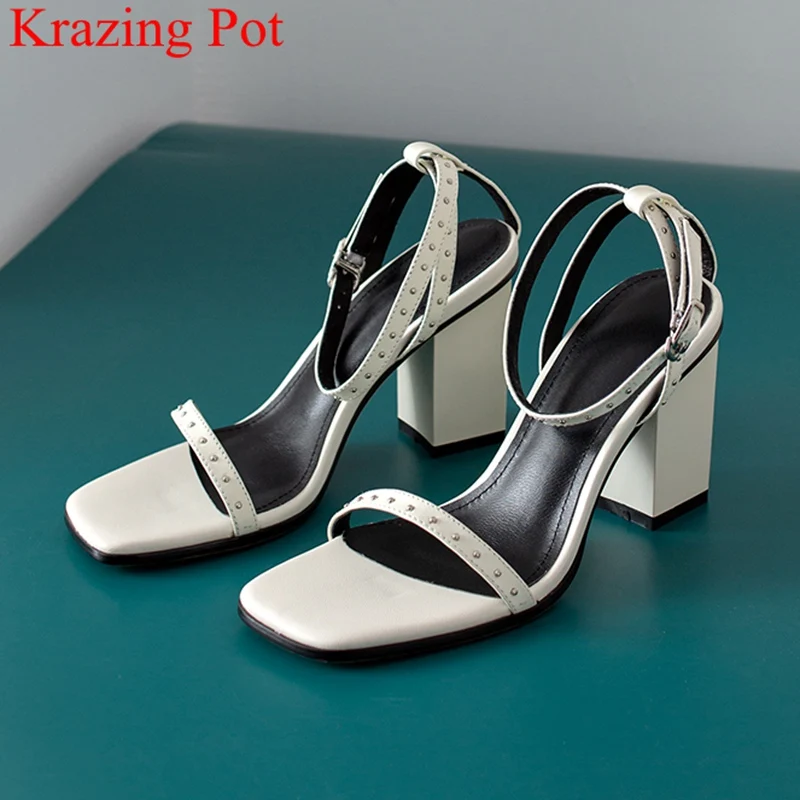superstar cow leather peep toe high heels brand women sandals buckle strap party elegant rivet solid wedding summer shoes L66
superstar cow leather peep toe high heels brand women sandals buckle strap party elegant rivet solid wedding summer shoes L66