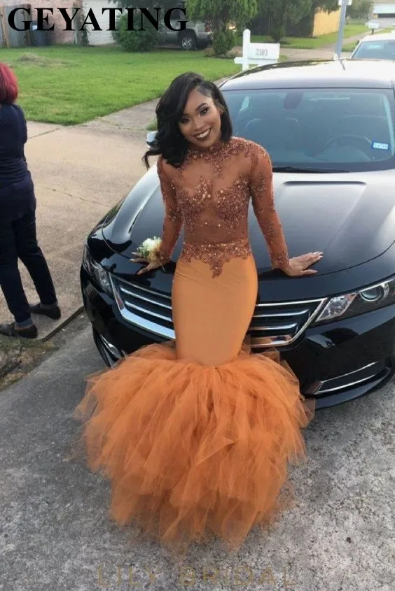 Elegant Long Sleeve Mermaid African Orange Prom Dresses for Black Girls Illusion Appliques Tiered Ruffles Plus Size Evening Gown
Elegant Long Sleeve Mermaid African Orange Prom Dresses for Black Girls Illusion Appliques Tiered Ruffles Plus Size Evening Gown