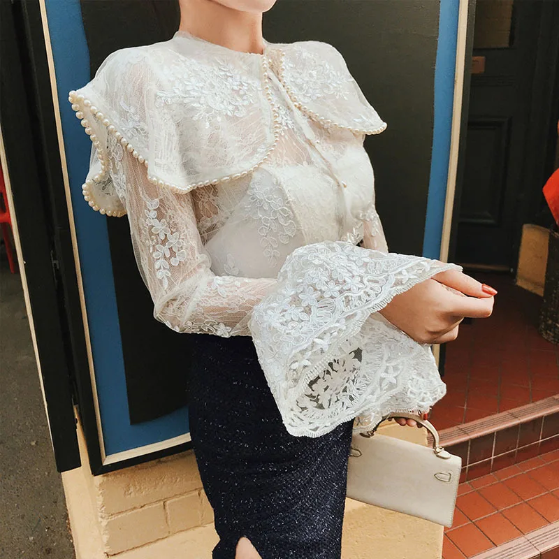 2019 Brand New Pearls Beading Turndown Collar Long Sleeve Lace Shirt Transparent White Blouse Women Tops Chemise Blusa Mujer
2019 Brand New Pearls Beading Turndown Collar Long Sleeve Lace Shirt Transparent White Blouse Women Tops Chemise Blusa Mujer