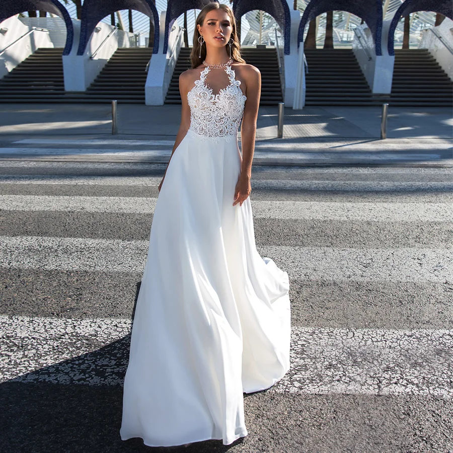 Halter High Neck Wedding Dresses 2019 Long Sleeveless Beading Lace Applique Bridal Gowns Illusion Back Robe De Mariage
Halter High Neck Wedding Dresses 2019 Long Sleeveless Beading Lace Applique Bridal Gowns Illusion Back Robe De Mariage