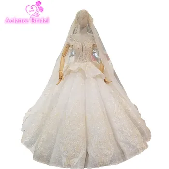 2018 Arabic Champagne Lace Sleeveless Bridal Gowns Floor-length Backless Waves Ball Gown Vintage Wedding Dresses With Long Veil
2018 Arabic Champagne Lace Sleeveless Bridal Gowns Floor-length Backless Waves Ball Gown Vintage Wedding Dresses With Long Veil