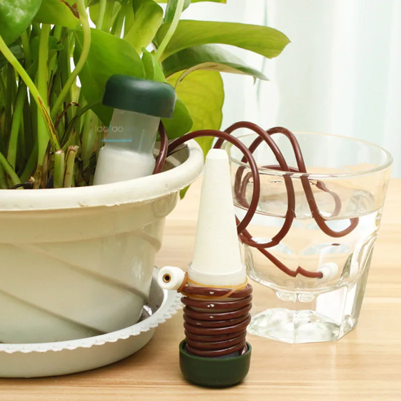 Self Watering Indoor Plants Automatic Drip Irrigation Watering System Flower Pot Waterer Tool Plants Water Automatic Device
Self Watering Indoor Plants Automatic Drip Irrigation Watering System Flower Pot Waterer Tool Plants Water Automatic Device