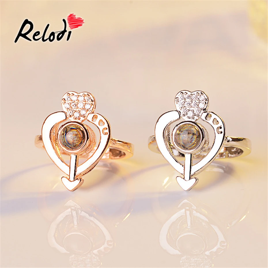 Relodi Heart-Shaped Projection Ring 100 Language I Love You Rings Rose Gold Engagement Ring for Women Party Accessories SP2548
Relodi Heart-Shaped Projection Ring 100 Language I Love You Rings Rose Gold Engagement Ring for Women Party Accessories SP2548