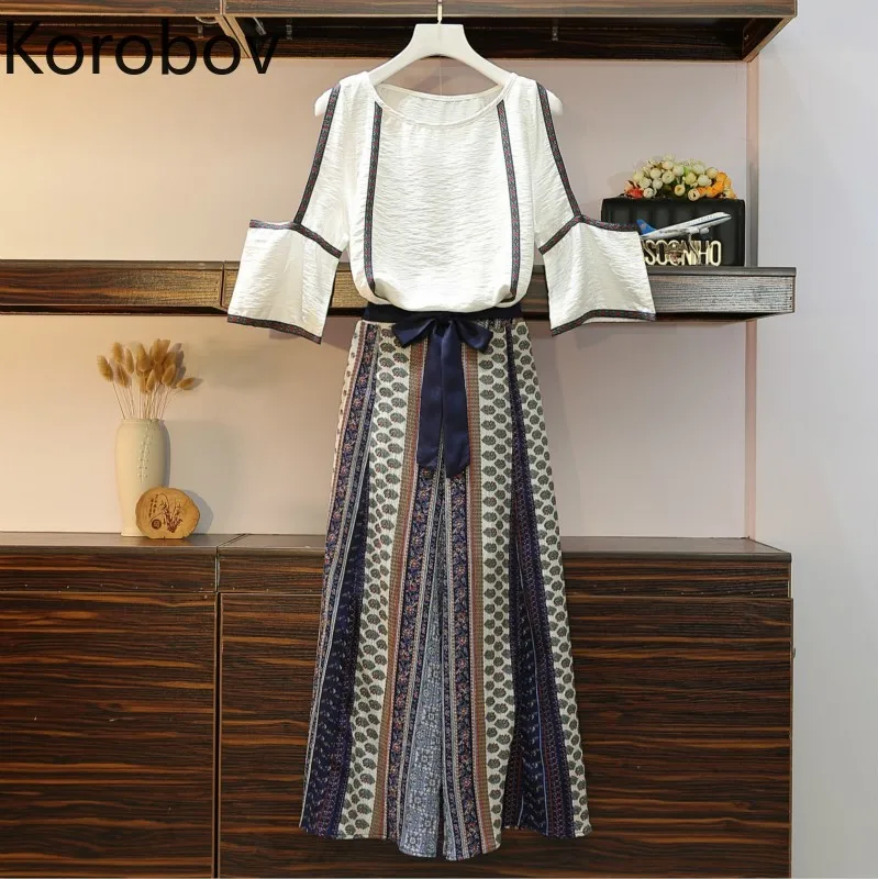 Korobov Plu Size Suits Elastics High Waist Wide Leg Pants + Patchwork O Neck Short Sleeve Sets 2 Piece Outfits for Women 78383
Korobov Plu Size Suits Elastics High Waist Wide Leg Pants + Patchwork O Neck Short Sleeve Sets 2 Piece Outfits for Women 78383