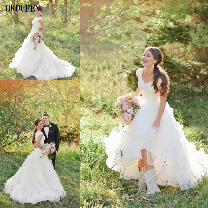 Vintage Country Wedding Dresses 2019 A-Line Pick Up Short Cap Sleeve Bride vestido de noiva Photograph robe mariage Bridal Gowns
Vintage Country Wedding Dresses 2019 A-Line Pick Up Short Cap Sleeve Bride vestido de noiva Photograph robe mariage Bridal Gowns
