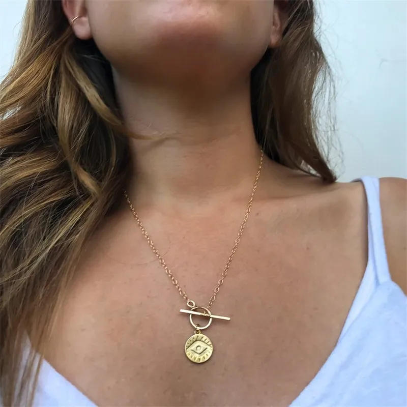 Minimalist Gold Silver Color Coin Evil Eye Pendant Necklaces for Women New Straight Bar lock Chain Choker Necklace Party Gifts
Minimalist Gold Silver Color Coin Evil Eye Pendant Necklaces for Women New Straight Bar lock Chain Choker Necklace Party Gifts