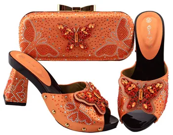 Latest Orange Color Shoe and Bag Italian Design Set Decorated with Rhinestone African Wedding Shoe and Bag Nigerian Women JZS-05
Latest Orange Color Shoe and Bag Italian Design Set Decorated with Rhinestone African Wedding Shoe and Bag Nigerian Women JZS-05