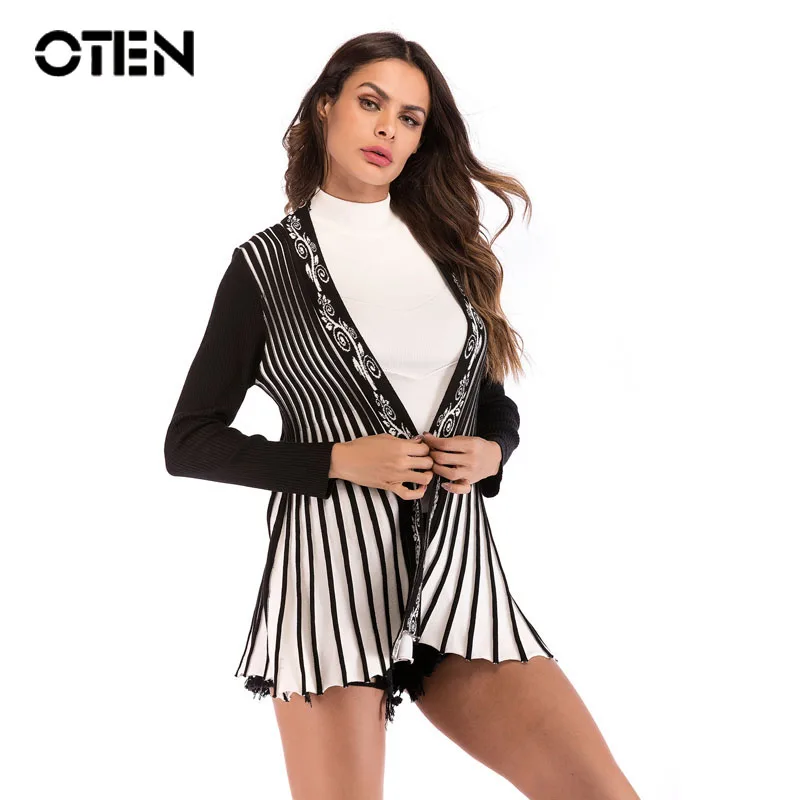 OTEN 2018 Autumn fashion women Long Sleeve cardigans Tops Black White Striped knitting cardigan jacket Casual outerwear sweater
OTEN 2018 Autumn fashion women Long Sleeve cardigans Tops Black White Striped knitting cardigan jacket Casual outerwear sweater