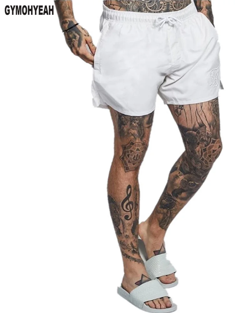 new fashion trend summer Men's Beach Shorts compression Fast drying gyms Bodybuilding Joggers sweatpants Shorts men clothing
new fashion trend summer Men's Beach Shorts compression Fast drying gyms Bodybuilding Joggers sweatpants Shorts men clothing