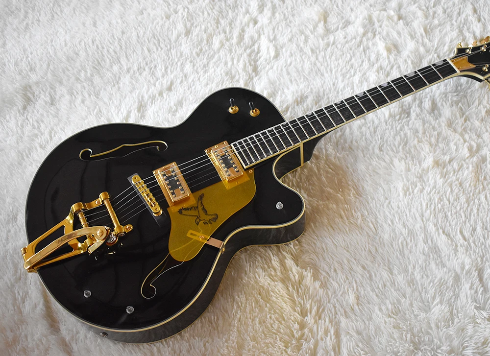 Factory Custom Semi-Hollow Black Electric Guitar with Tremolo System,Gold Hardware,Cream Binding Body and Neck,Can be Customized
Factory Custom Semi-Hollow Black Electric Guitar with Tremolo System,Gold Hardware,Cream Binding Body and Neck,Can be Customized