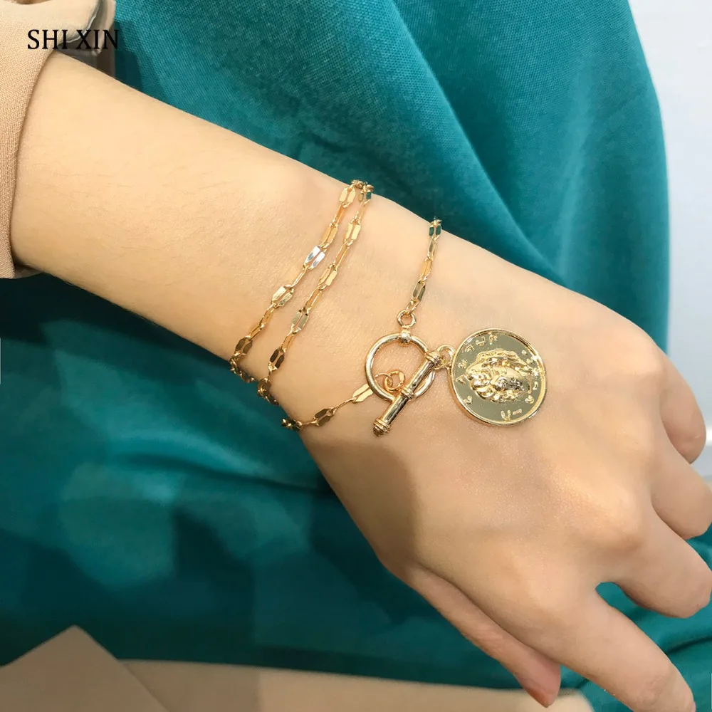 SHIXIN Fashion Boho Layered Charms Bracelet Queen Portrait Rune Coin Pendants Fashion Jewelry Women Cuff Love Hand Chain Female
SHIXIN Fashion Boho Layered Charms Bracelet Queen Portrait Rune Coin Pendants Fashion Jewelry Women Cuff Love Hand Chain Female