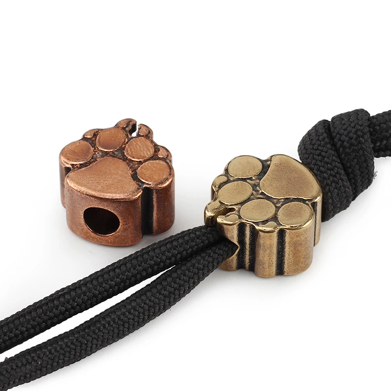 Dog Paw Brass Knife Beads Umbrella Rope DIY EDC Red Copper Claw Lanyard Paracord Bead
Dog Paw Brass Knife Beads Umbrella Rope DIY EDC Red Copper Claw Lanyard Paracord Bead