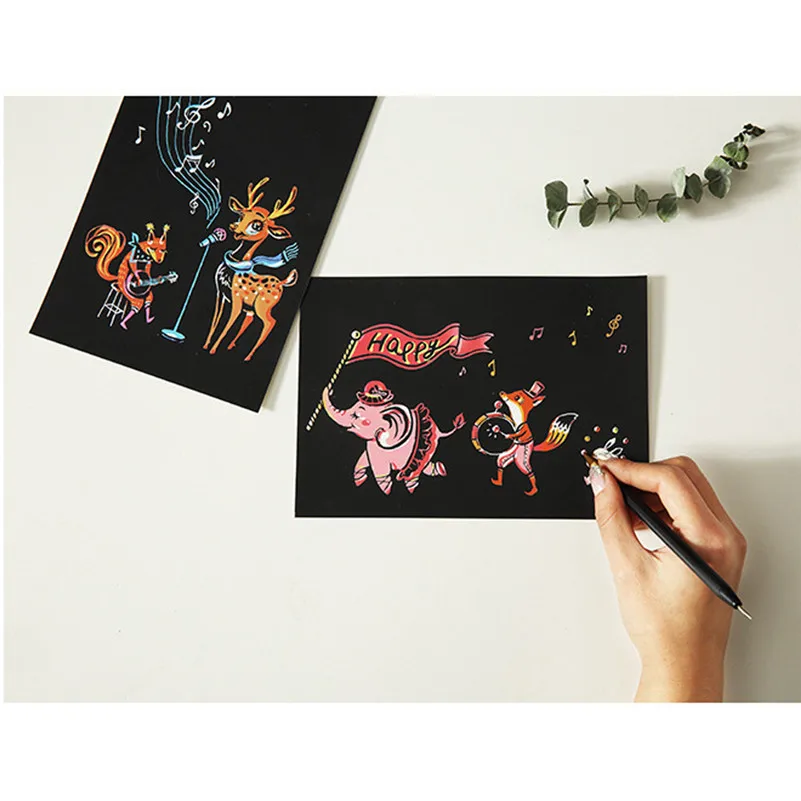 4pcs 20x14cm Magic Scratch Art Painting Paper With Drawing Stick Kids Toy Educational board Toy for baby girl boy children A1
4pcs 20x14cm Magic Scratch Art Painting Paper With Drawing Stick Kids Toy Educational board Toy for baby girl boy children A1