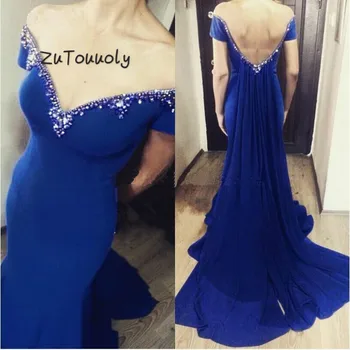 Unique Evening Dresses Long Royal Blue Off The Shoulder Mermaid Prom Dress With Short Sleeve Elegant Beaded Backless Ribbon Gown
Unique Evening Dresses Long Royal Blue Off The Shoulder Mermaid Prom Dress With Short Sleeve Elegant Beaded Backless Ribbon Gown