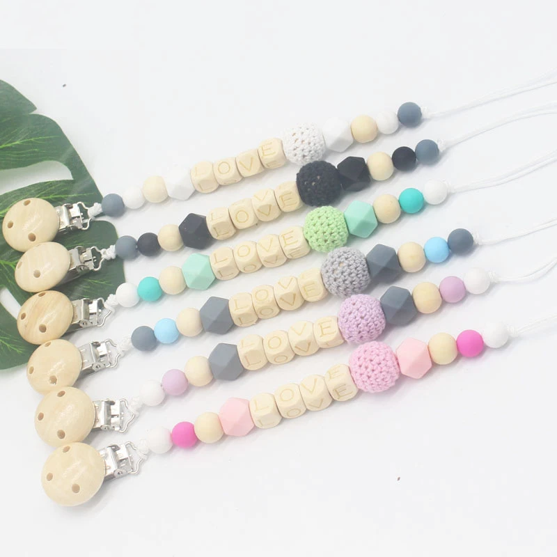 Wood Pacifier Clip Wooden Bead Dummy Clip Holder Cute Pacifier Clips Soother Chains Baby Teething Toy for Baby Chew
Wood Pacifier Clip Wooden Bead Dummy Clip Holder Cute Pacifier Clips Soother Chains Baby Teething Toy for Baby Chew
