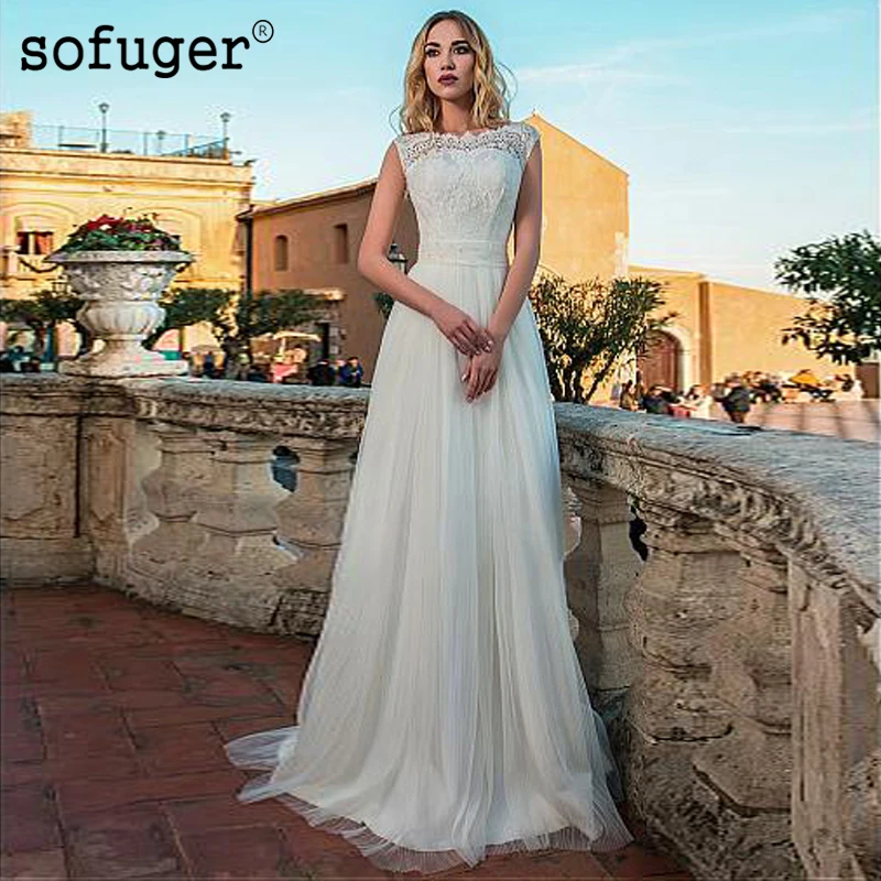 Long Tulle Beach Bridal Dress A-line Lace Appliques Boho Wedding Dress Gown Sofuge Vestido De Noiva Dubai Arabic Suknia Slubna
Long Tulle Beach Bridal Dress A-line Lace Appliques Boho Wedding Dress Gown Sofuge Vestido De Noiva Dubai Arabic Suknia Slubna