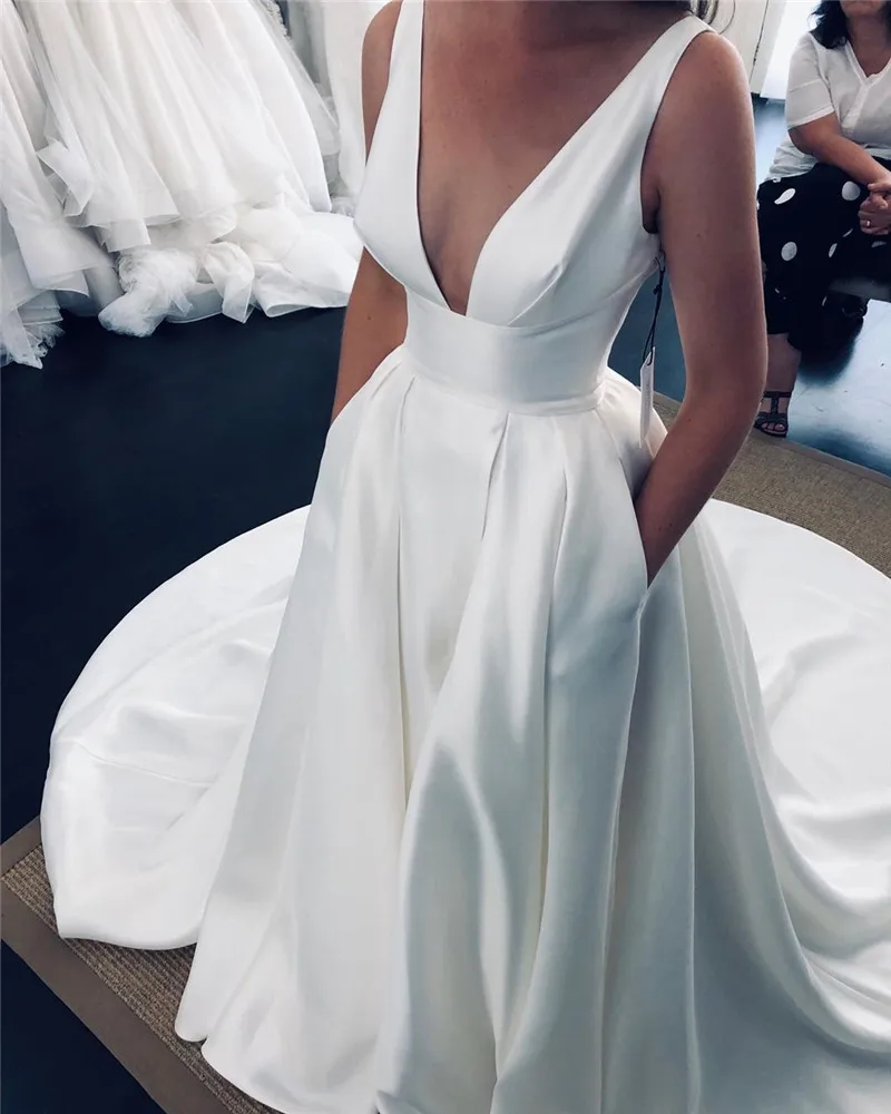 Modest Plus Size V Neck Wedding Dresses 2020 A Line Deep V-Neck Simple Satin Front Split Country Bridal Gowns Vestido De Novia
Modest Plus Size V Neck Wedding Dresses 2020 A Line Deep V-Neck Simple Satin Front Split Country Bridal Gowns Vestido De Novia