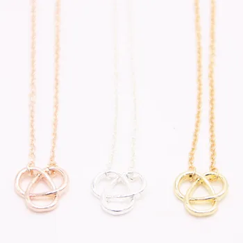 Abstract trillium pendant necklace cross three arc-shaped pendant necklace designed for women
Abstract trillium pendant necklace cross three arc-shaped pendant necklace designed for women