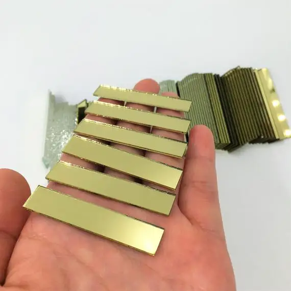 MEYA Rectangular 3/8" x 2" Mirror Mosaic Tiles Gold Colored Craft Mirror pieces pack of 100
MEYA Rectangular 3/8" x 2" Mirror Mosaic Tiles Gold Colored Craft Mirror pieces pack of 100