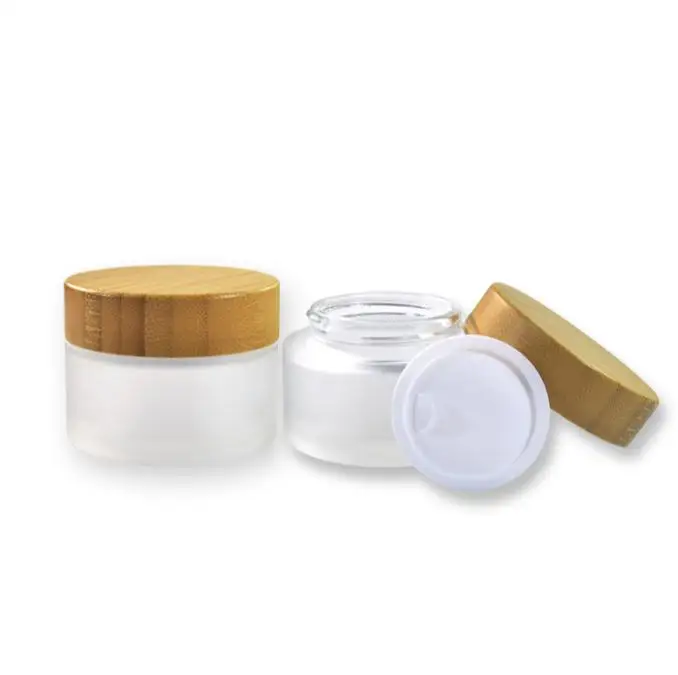 50pcs *50g cosmetic bamboo lid glass jar, 50g face cream frost glass jar with bamboo lid SN774 
50pcs *50g cosmetic bamboo lid glass jar, 50g face cream frost glass jar with bamboo lid SN774