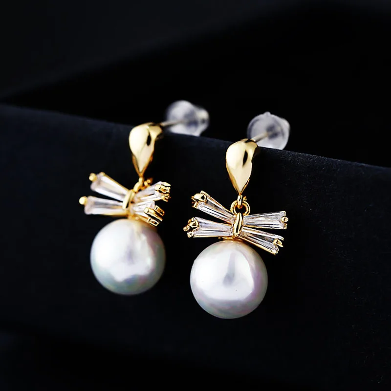 new fashion gold colour bowknot zircon korean earring s925 silver needle geometric round pearl earrings for women jewelry gift
new fashion gold colour bowknot zircon korean earring s925 silver needle geometric round pearl earrings for women jewelry gift