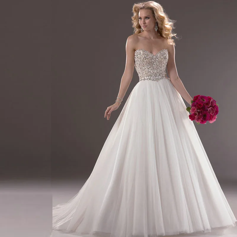 2015 A Line Wedding Dresses Sweetheart Beaded Bodice Tulle White Long Sweep Train Modest Bridal Gowns
2015 A Line Wedding Dresses Sweetheart Beaded Bodice Tulle White Long Sweep Train Modest Bridal Gowns