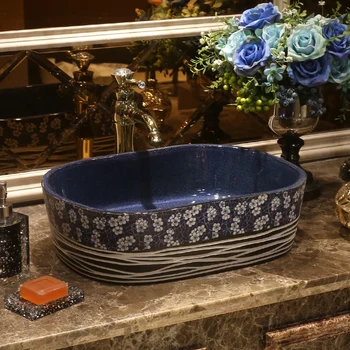 Artistic blue and white Porcelain Bathroom Sink Wash Basin Ceramic wash basin Bathroom Sink Plum blossom pattern oval
Artistic blue and white Porcelain Bathroom Sink Wash Basin Ceramic wash basin Bathroom Sink Plum blossom pattern oval