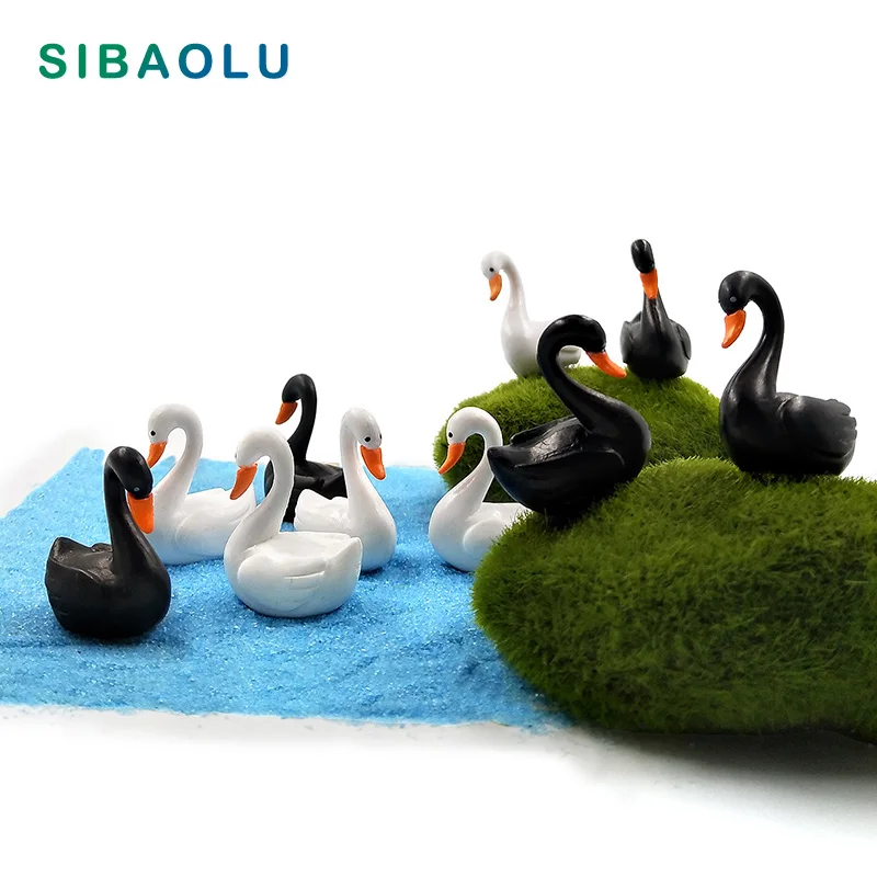 10pc/lot Black White Swan miniature Figurine Cartoon Love Ducks decoration mini fairy garden animals statue Home Desk ornaments
10pc/lot Black White Swan miniature Figurine Cartoon Love Ducks decoration mini fairy garden animals statue Home Desk ornaments