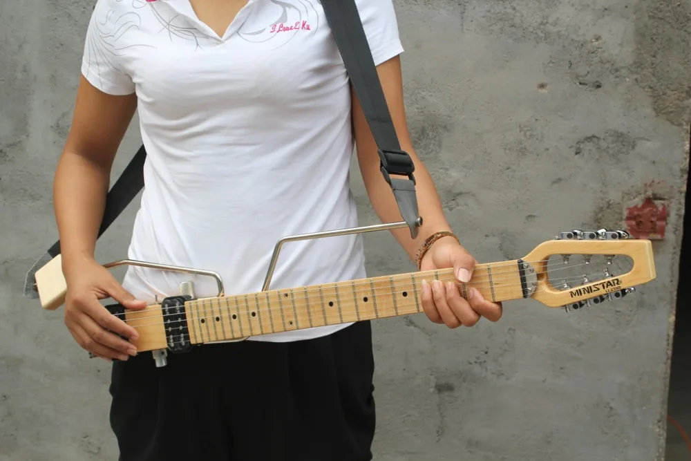 2019 new + factory + Mini Star travel 6 strings mute electric guitar portable Mini Star Brand easy taking guitar Free Shipping
2019 new + factory + Mini Star travel 6 strings mute electric guitar portable Mini Star Brand easy taking guitar Free Shipping