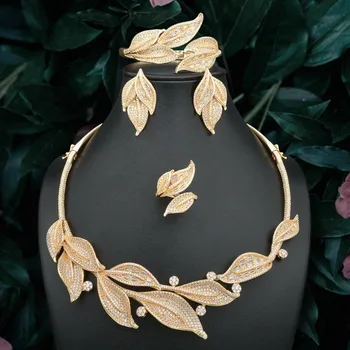 ModemAngel Exquisite Leaves Shiny AAA Cubic Zirconia Gold Color Necklace Earrings Bracelet Ring Full Set 
ModemAngel Exquisite Leaves Shiny AAA Cubic Zirconia Gold Color Necklace Earrings Bracelet Ring Full Set