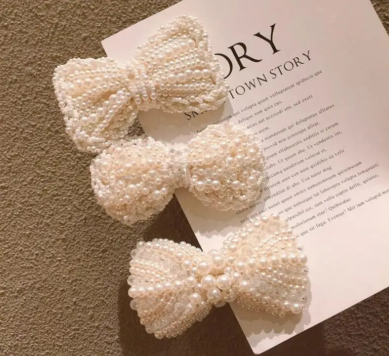 Large size pearl crystal bow hairpin temperament duckbill clip adult hair accessories
Large size pearl crystal bow hairpin temperament duckbill clip adult hair accessories