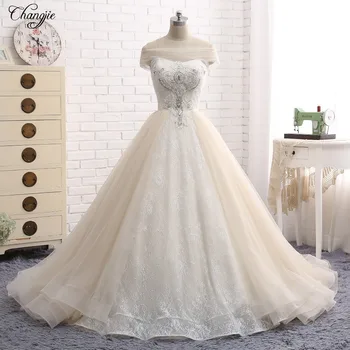 New Elegant Long Wedding Dress 2018 Boat Neck Ball Gown Chapel Train Beaded Appliques Tulle Bridal Gowns Vestido de noiva
New Elegant Long Wedding Dress 2018 Boat Neck Ball Gown Chapel Train Beaded Appliques Tulle Bridal Gowns Vestido de noiva
