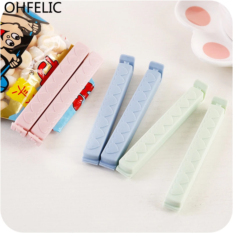 5pcs/lot Packs Food Storage Seal Sealing Bag Clips Sealer Clamp Solid Color Food Kitchen Tool Accessories Food Close Clip Seal
5pcs/lot Packs Food Storage Seal Sealing Bag Clips Sealer Clamp Solid Color Food Kitchen Tool Accessories Food Close Clip Seal