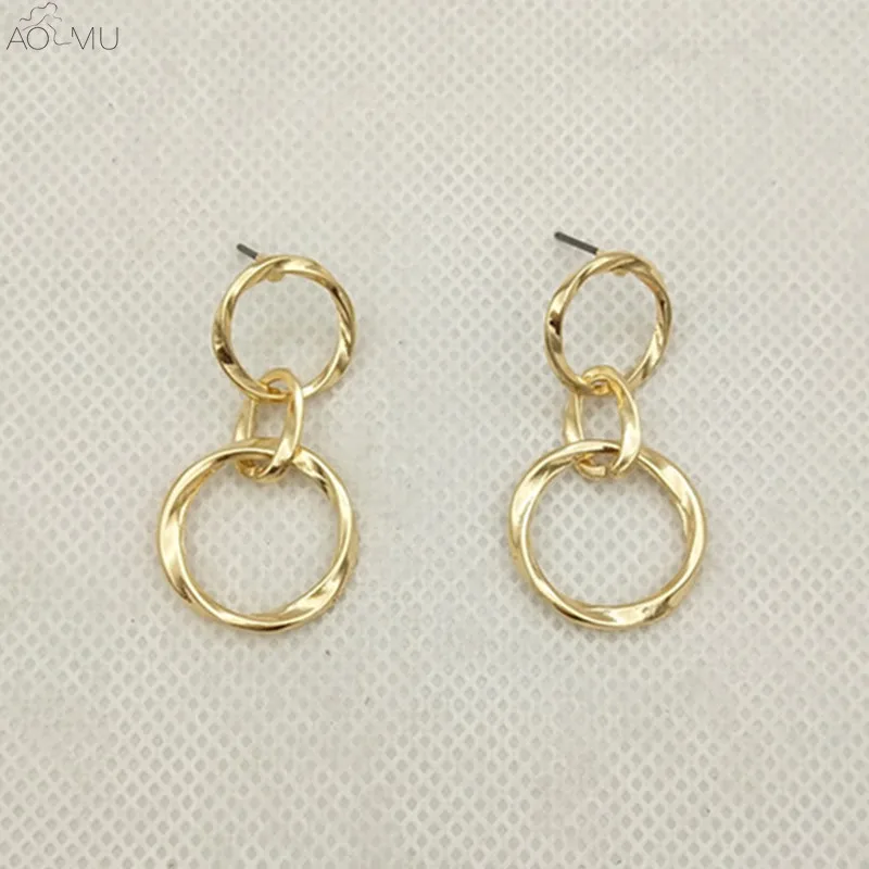 AOMU New Simple Gold Sliver Metal Geometric twist Round Circle Drop Earrings For Women Dangle Earrings Jewelry
AOMU New Simple Gold Sliver Metal Geometric twist Round Circle Drop Earrings For Women Dangle Earrings Jewelry
