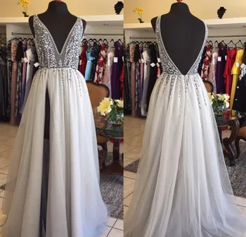 Silver Muslim Evening Dresses Sexy A-line V-neck Tulle Beaded Crystals Slit Islamic Dubai Saudi Arabic Long Evening Gown Prom
Silver Muslim Evening Dresses Sexy A-line V-neck Tulle Beaded Crystals Slit Islamic Dubai Saudi Arabic Long Evening Gown Prom