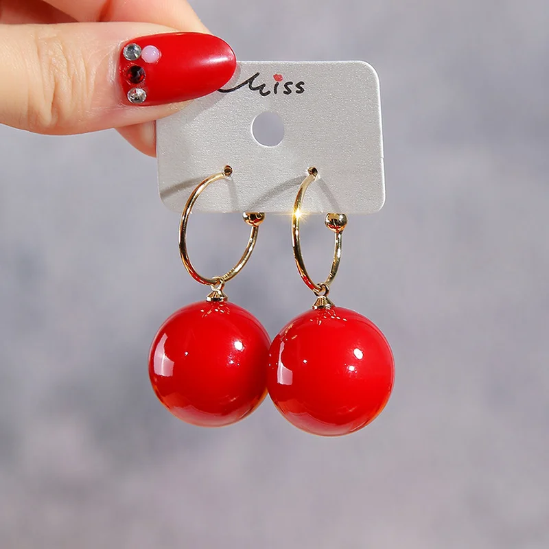 New Fashion Korean Imitation pearls earrings for women Round trendy exaggeration red luxury jewelry trendy earrings
New Fashion Korean Imitation pearls earrings for women Round trendy exaggeration red luxury jewelry trendy earrings