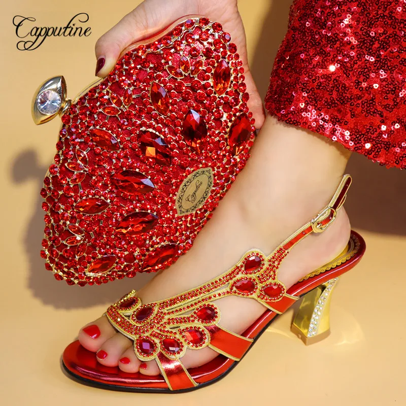 Capputine Newest African Women Design Shoes With Bag Set For Wedding Italian Pretty Pumps Shoes And Bags Set Free Shipping TX-08
Capputine Newest African Women Design Shoes With Bag Set For Wedding Italian Pretty Pumps Shoes And Bags Set Free Shipping TX-08